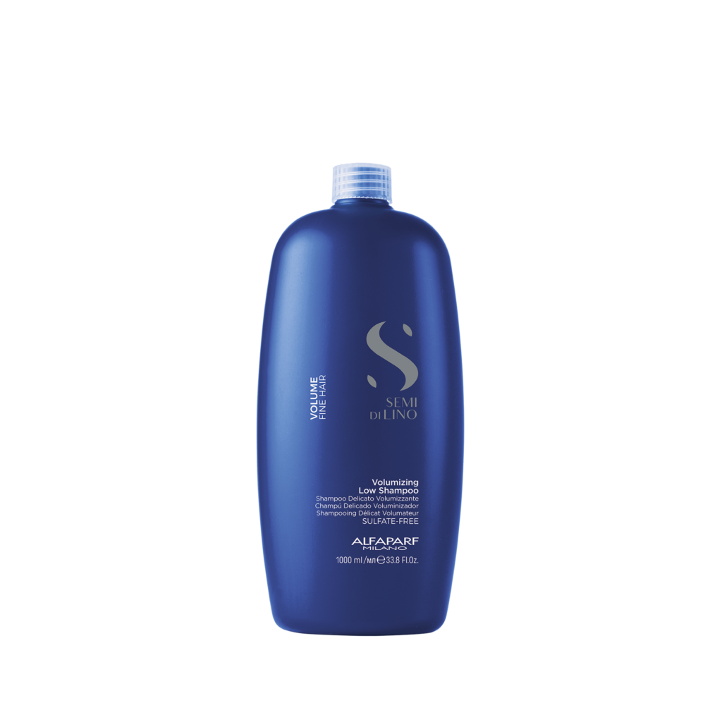 A bottle of shampoo is shown on a black background.