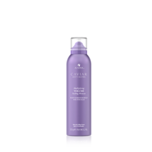 A purple spray bottle with a white label.